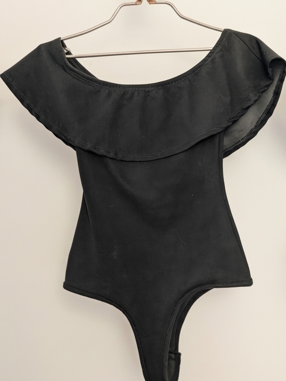 Black Off-Shoulder Ruffle Bodysuit with Notch Detail - Picture 2 of 2